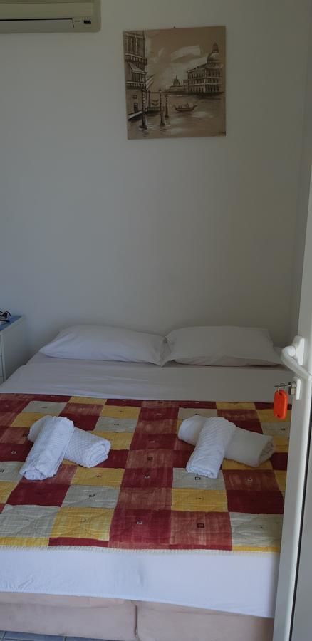 Апартаменты Apartments Dragišić Свети-Стефан