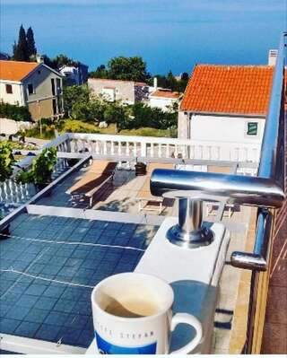 Апартаменты Apartments Dragišić Свети-Стефан Апартаменты с видом на море-13